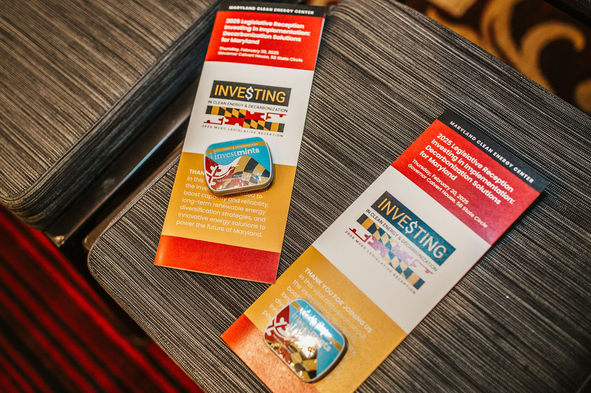 Two brochures are placed on a textured surface. Both brochures provide information related to financial topics.