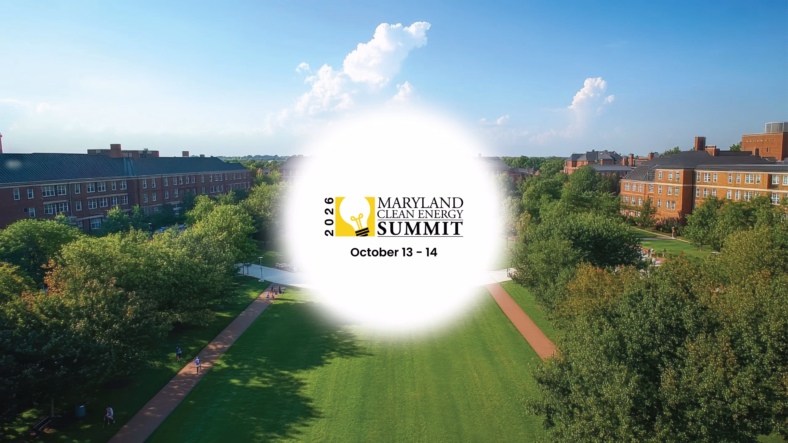 A green park area with trees and pathways is shown, surrounded by buildings. In the center, there is a logo for the 2026 Maryland Clean Energy Summit, with the dates October 13-14 displayed prominently. The sky is clear with a few clouds